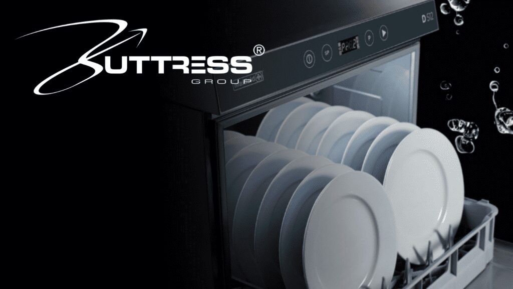 Dishwasher with clean white plates inside at H2 Equity Partners.
