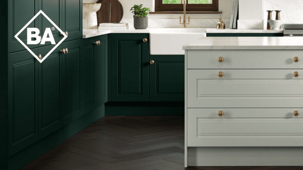 Elegant kitchen cabinets with dark green and grey tones, featuring gold hardware.